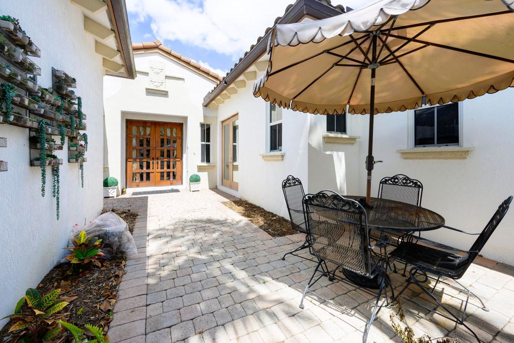 Photo of 1081 Vintner Boulevard, Palm Beach Gardens, FL 33410 (MLS # R11093178)