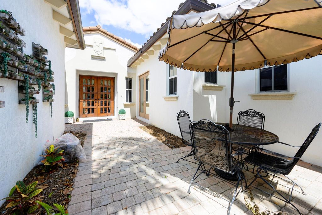Photo of 1081 Vintner Boulevard, Palm Beach Gardens, FL 33410 (MLS # R11093178)
