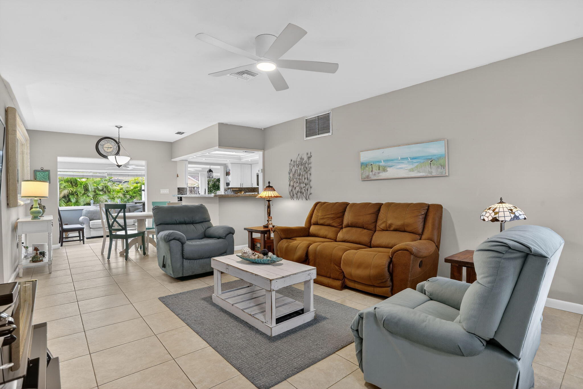 View photos, virtual tours, details... 6440 NW 22nd Court