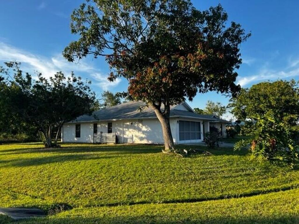 Photo of 2661 SE Osage Avenue, Port Saint Lucie, FL 34952 (MLS # R11140583)