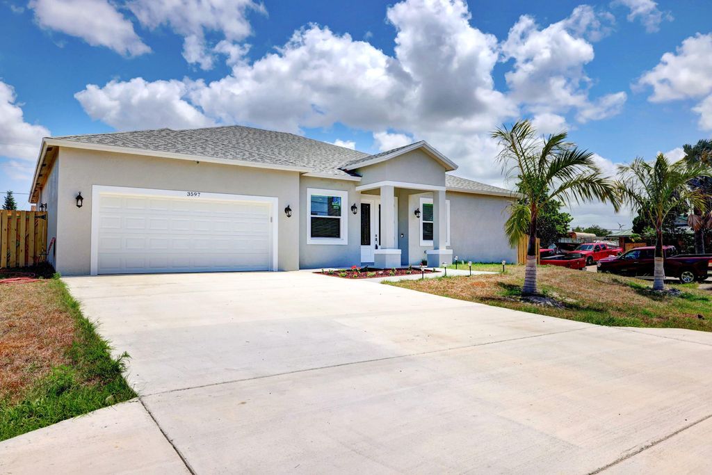 Photo of 3597 SW Rivera Street, Port Saint Lucie, FL 34953 (MLS # R10790331)