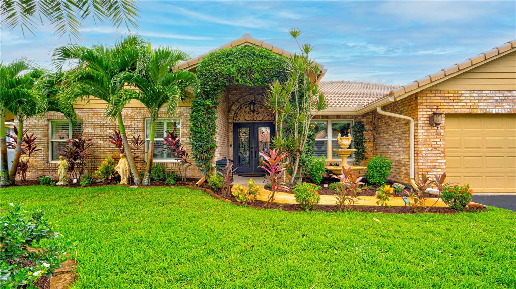 Photo of 10917 NW 14th Street, Coral Springs, FL 33071 (MLS # F10520119)