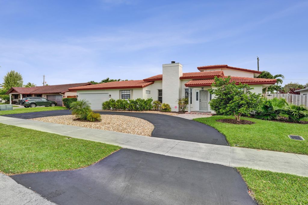 Photo of 1821 NW 43rd Street, Oakland Park, FL 33309 (MLS # B26016848)