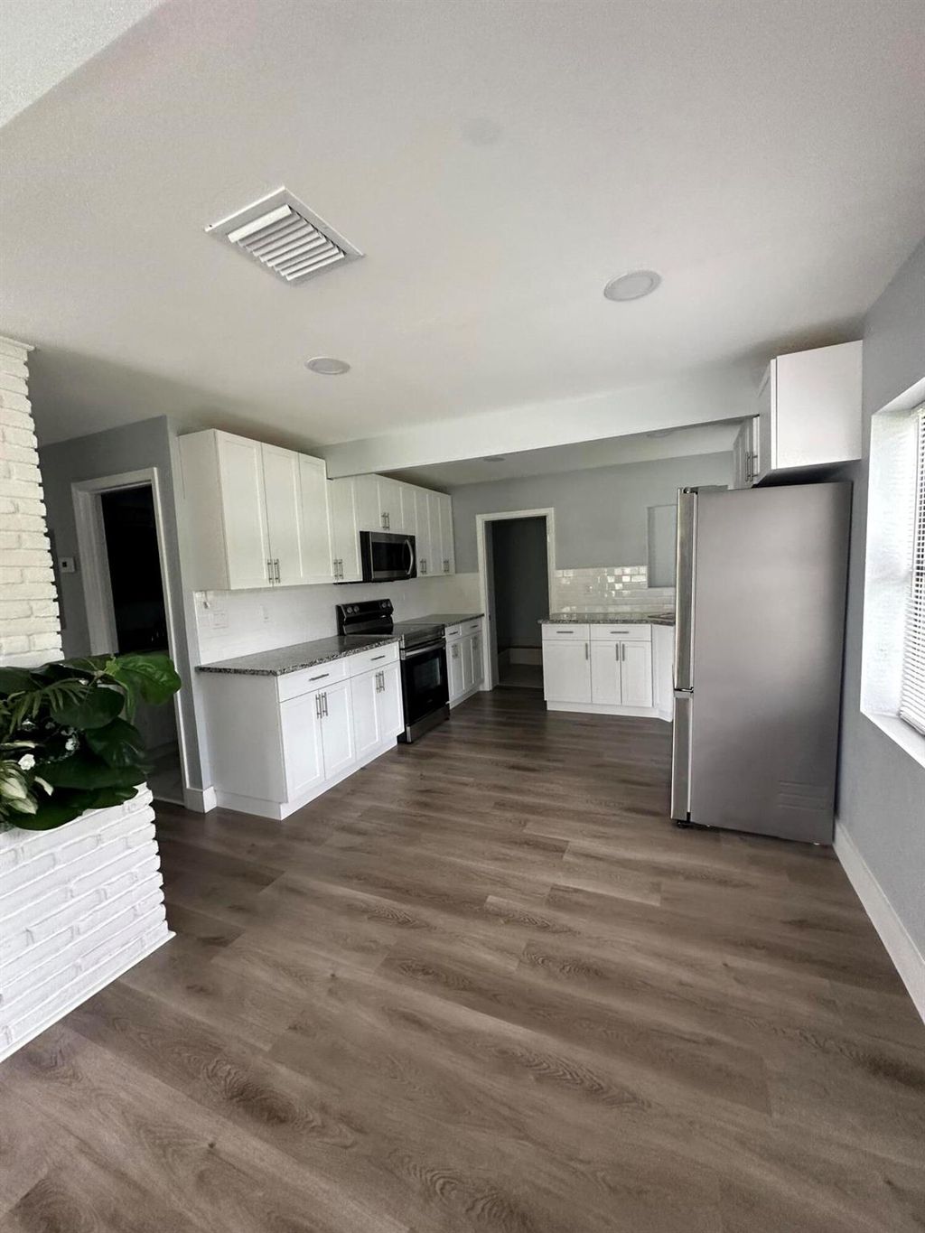 Photo of 1370 NE Martin Avenue #A, Jensen Beach, FL 34957 (MLS # R11068445)