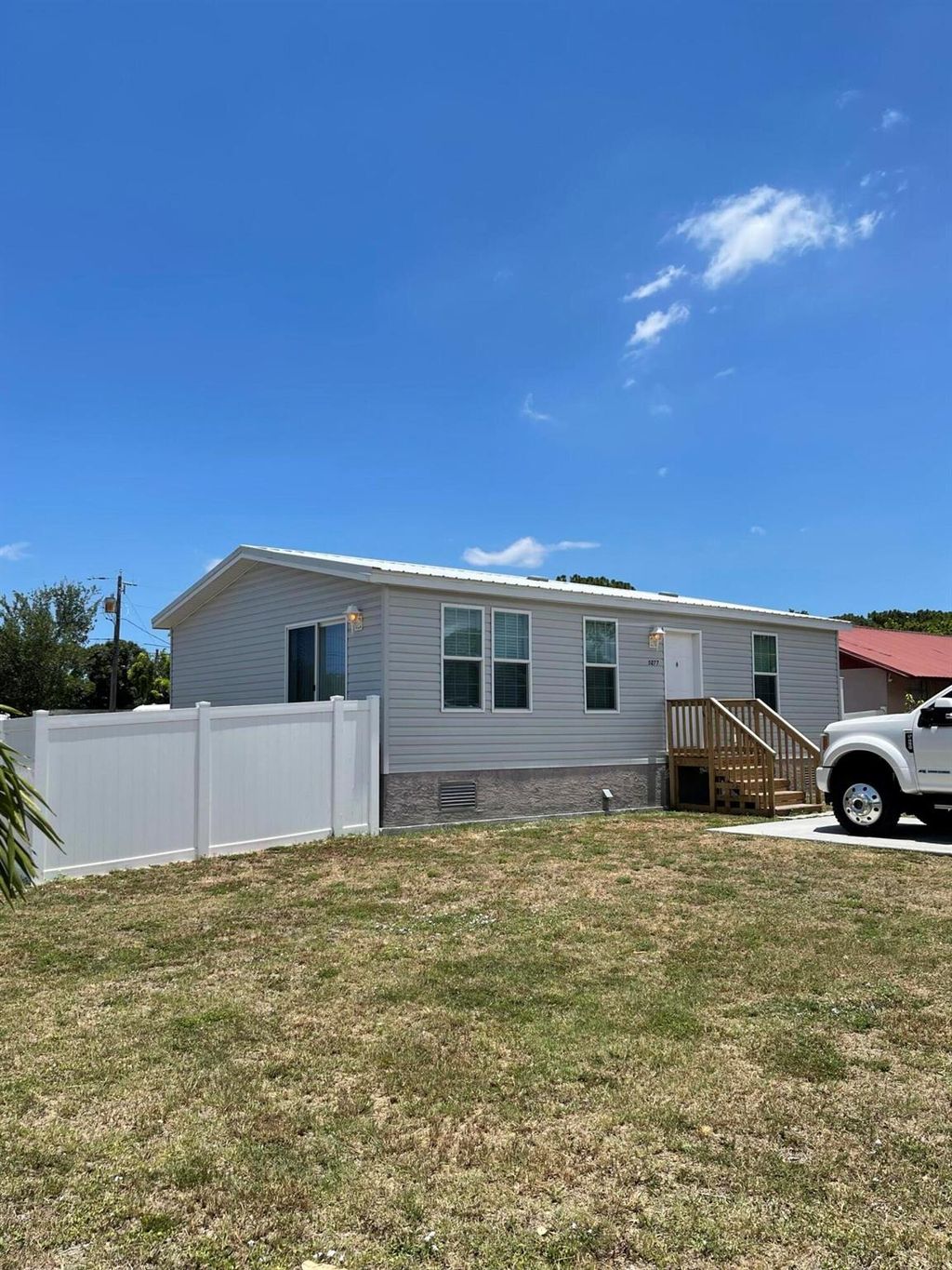 Photo of 5277 SE Driftwood Avenue, Stuart, FL 34997 (MLS # R10995033)