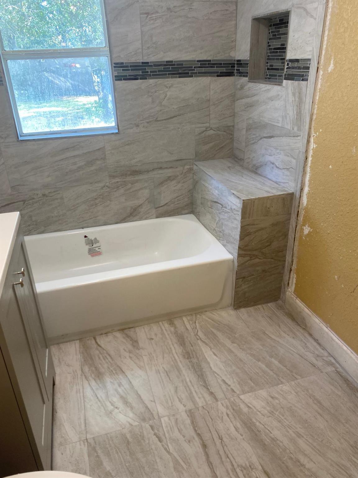 Well-maintained 3-bedroom, 2-bath home located just minutes from downtown Fort Pierce. Both bathrooms have been recently upgraded with modern finishes. Currently leased to long-term tenants, offering immediate rental income. Ideal for investors seeking a turnkey property or first-time buyers looking for a in home in a convenient location.