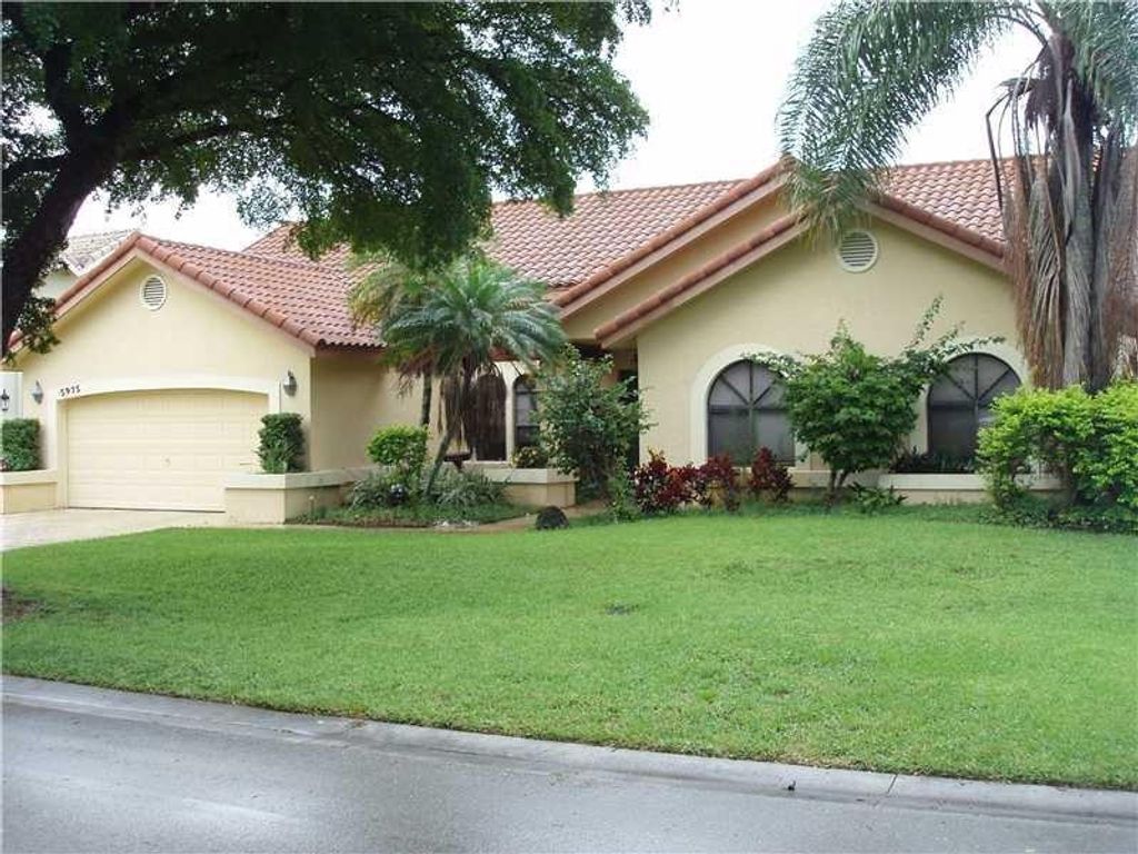Photo of 5975 NW 47th Place, Coral Springs, FL 33067 (MLS # F10549181)