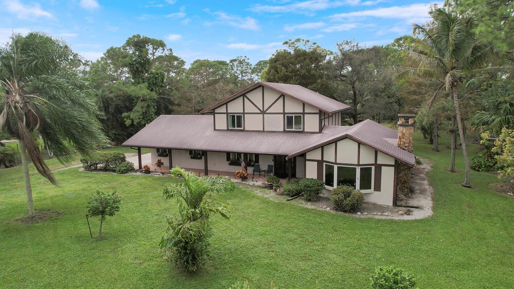 Photo of 4721 129th Avenue N, West Palm Beach, FL 33411 (MLS # R11038647)