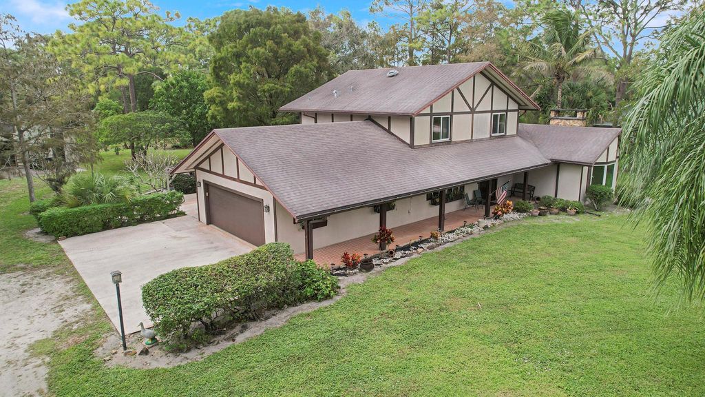 Photo of 4721 129th Avenue N, West Palm Beach, FL 33411 (MLS # R11038647)