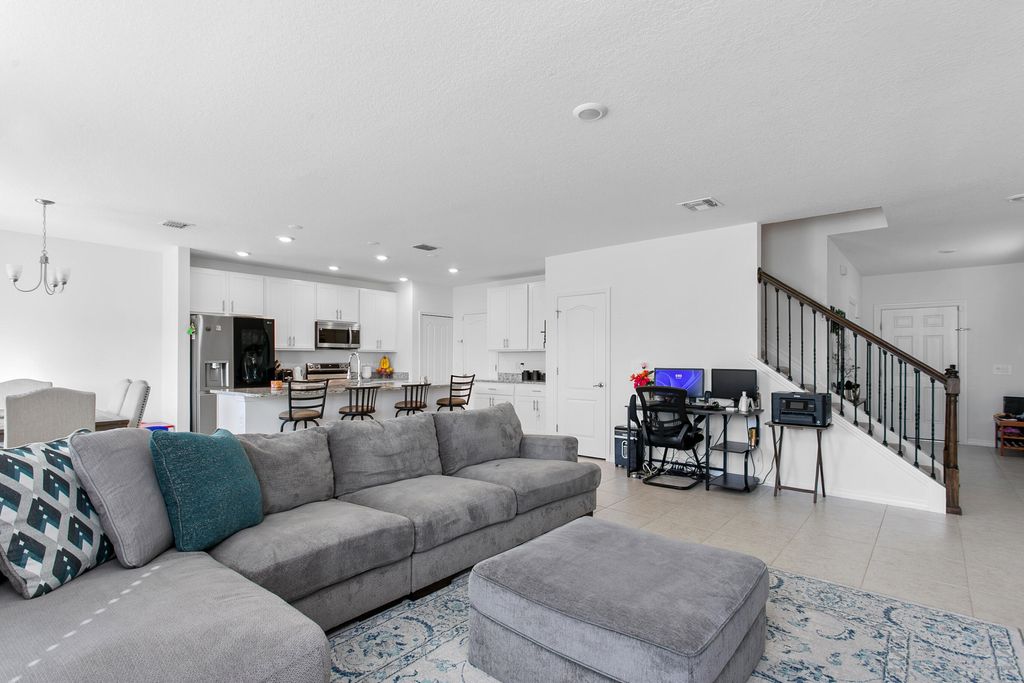 Photo of 10930 SW Vasari Way, Port Saint Lucie, FL 34987 (MLS # B26022739)