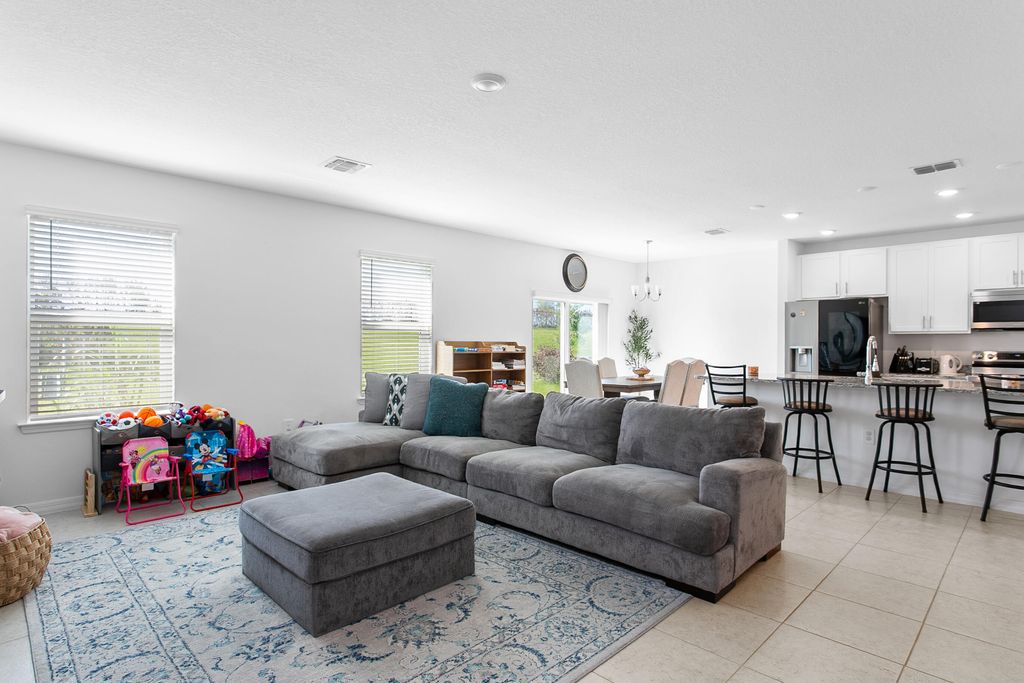 Photo of 10930 SW Vasari Way, Port Saint Lucie, FL 34987 (MLS # B26022739)