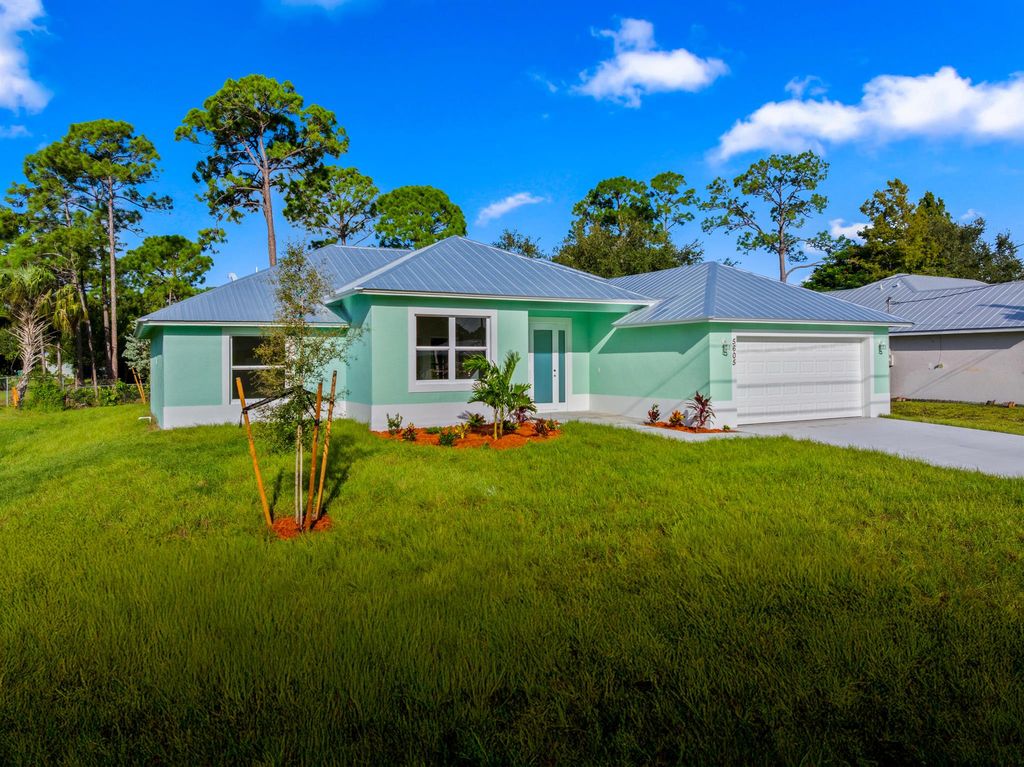 Photo of 5605 Seagrape Drive, Fort Pierce, FL 34982 (MLS # R11131844)