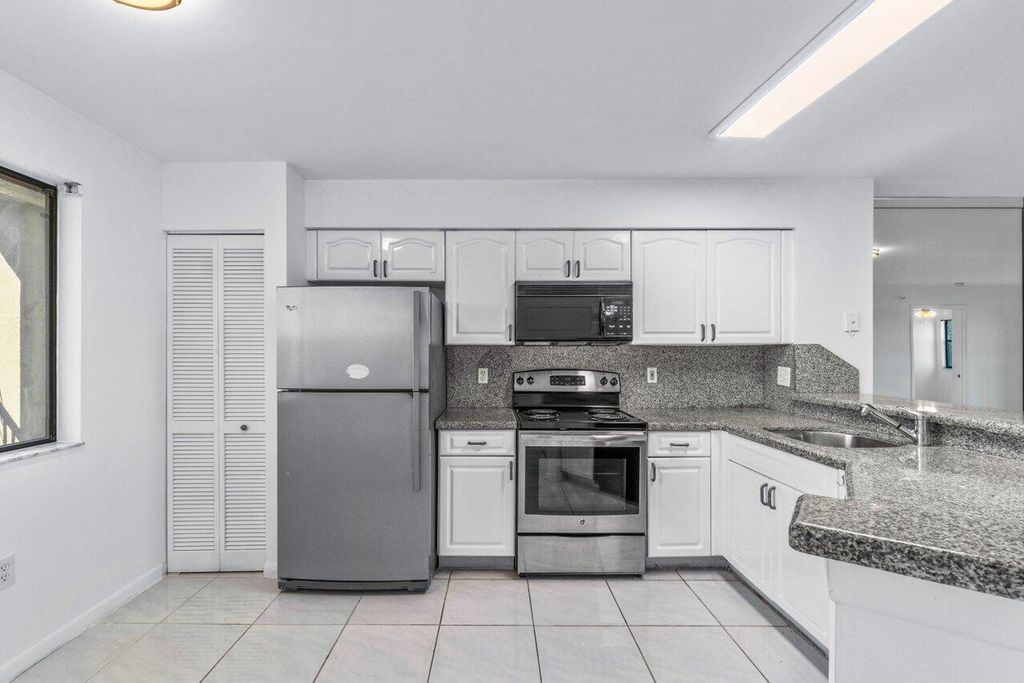 Photo of 2334 S Cypress Bend Drive #406, Pompano Beach, FL 33069 (MLS # R10940292)