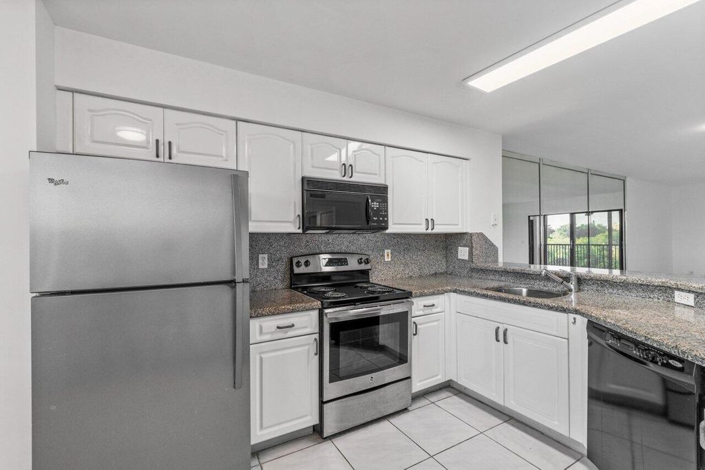 Photo of 2334 S Cypress Bend Drive #406, Pompano Beach, FL 33069 (MLS # R10940292)