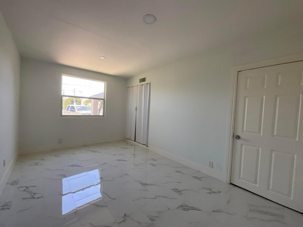 Photo of 3007 Georgia Avenue, West Palm Beach, FL 33405 (MLS # B26081412)