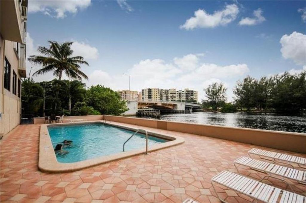 Photo of 1401 N Riverside Drive #307, Pompano Beach, FL 33062 (MLS # B26008199)