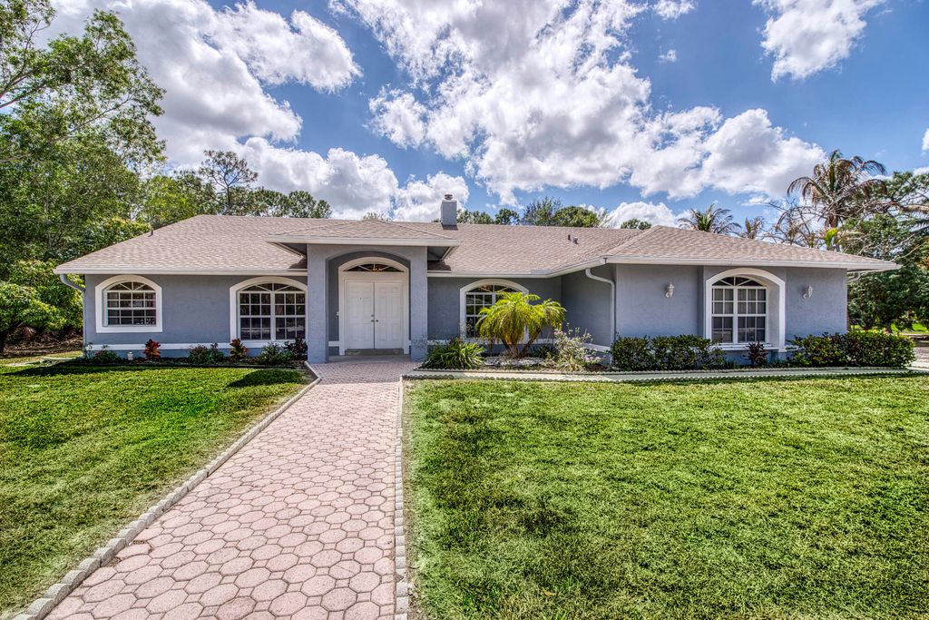 Photo of 13418 76th Road N, West Palm Beach, FL 33412 (MLS # B26004479)