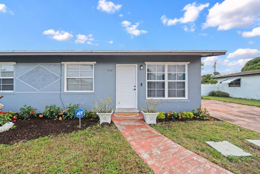 Photo of 1635 W 32nd Street, Riviera Beach, FL 33404 (MLS # R11158523)