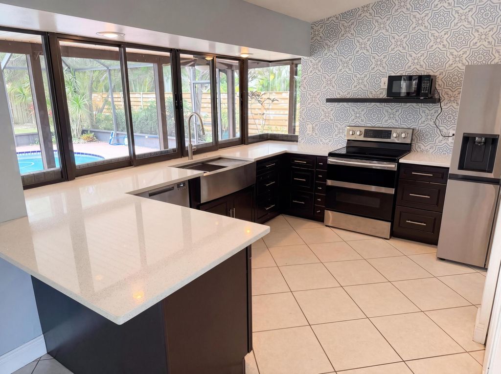 Photo of 786 SE Ablett Lane, Port Saint Lucie, FL 34984 (MLS # B26028650)