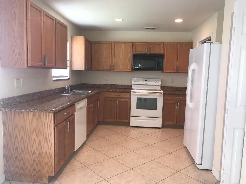 Photo of 2098 SW Newport Isles Boulevard, Port Saint Lucie, FL 34953 (MLS # R10977656)