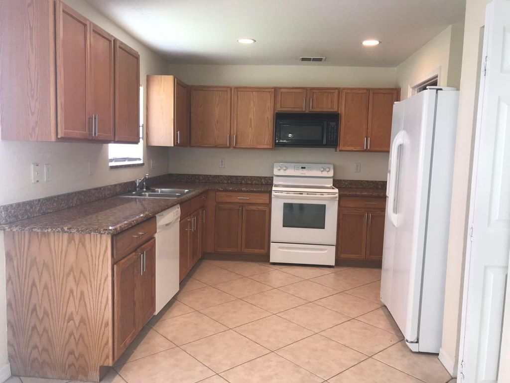 Photo of 2098 SW Newport Isles Boulevard, Port Saint Lucie, FL 34953 (MLS # R10977656)