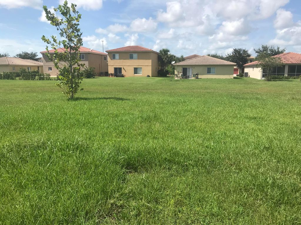 Photo of 2098 SW Newport Isles Boulevard, Port Saint Lucie, FL 34953 (MLS # R10977656)