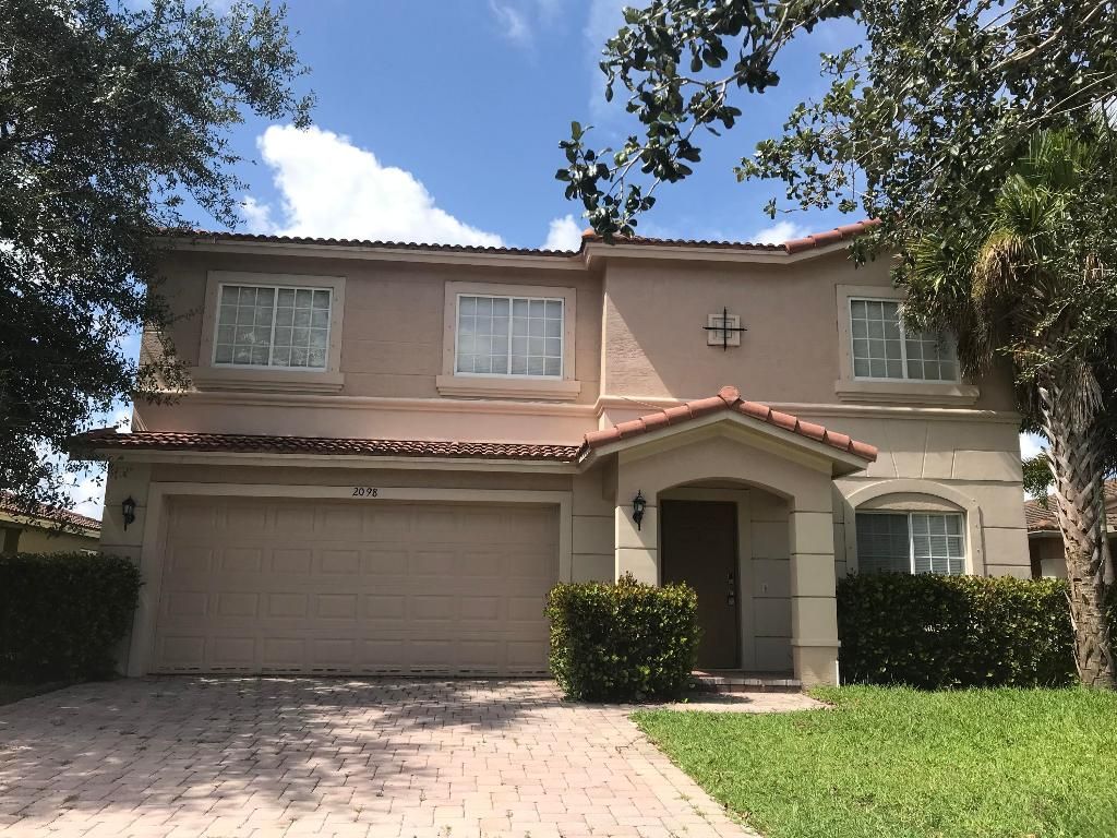 Photo of 2098 SW Newport Isles Boulevard, Port Saint Lucie, FL 34953 (MLS # R10977656)