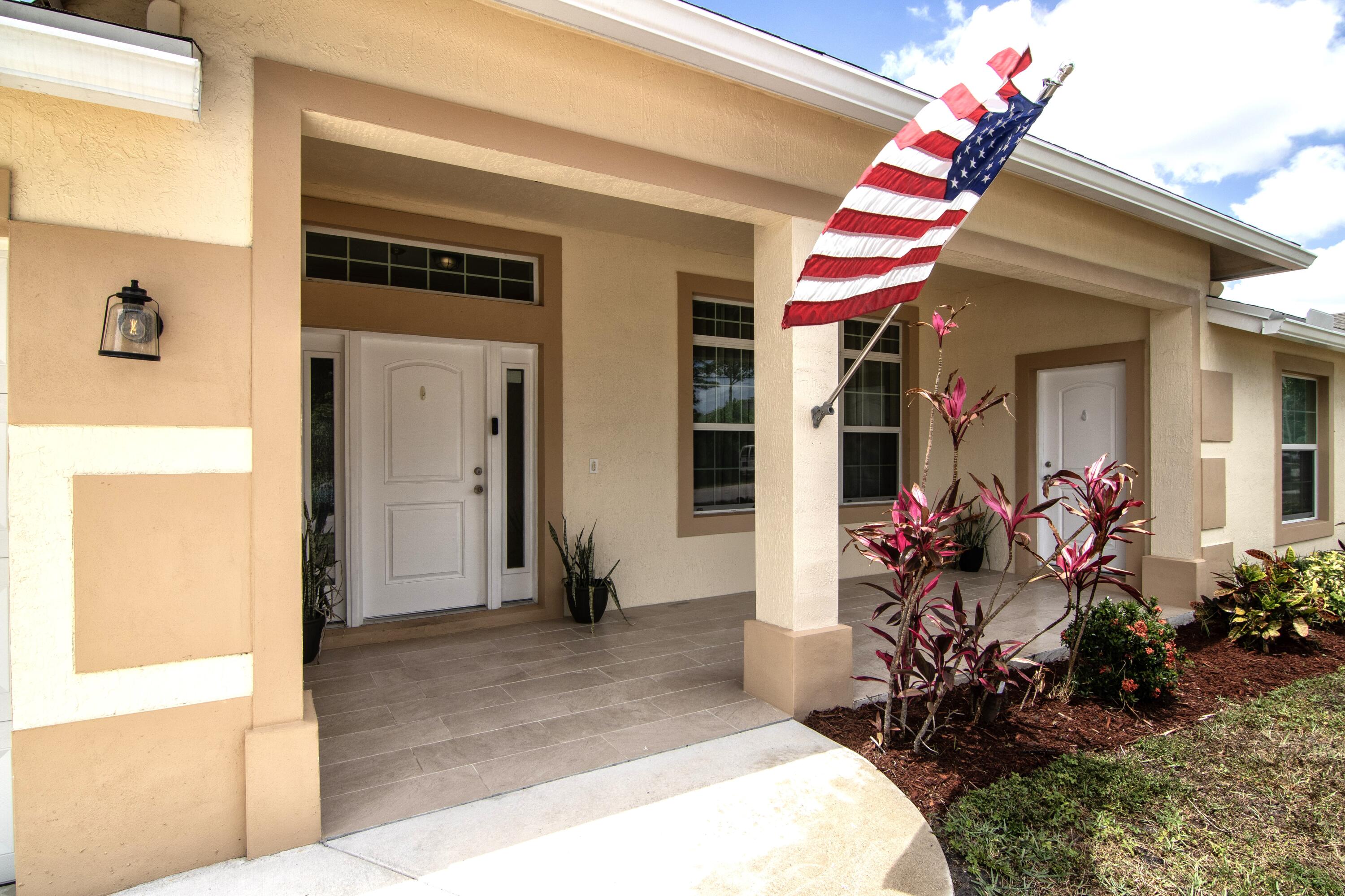 Modern Luxury in the Heart of Town - 4BR w/ Saltwater Pool, In-Law Suite & Spa!! Located in one of the best areas in town, this CBS construction, 2223 SF under air and 2,950 SF total, 2021-built 4BR/3.1BA home offers luxury and freedom with NO HOA. Enjoy the saltwater pool, Michael Phelps spa, cabana bath, outdoor shower, and an oversized, fenced lot with room for your boat, RV, motorcycle etc.. Inside, find a gourmet chef's kitchen with quartzite counters, stainless steel appliances, farm sink, and tile backsplash. The open layout features luxury vinyl/tile floors, impact glass, and beautifully detailed tray ceilings. Includes private in-law suite with separate entrance, dual walk-in closets in master, and shaded patios front and back. A true Florida retreat!