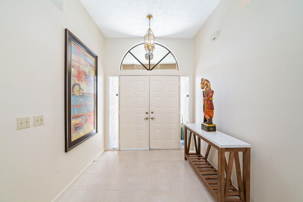 Photo of 1917 SE Bolton Avenue, Port Saint Lucie, FL 34952 (MLS # R10975228)