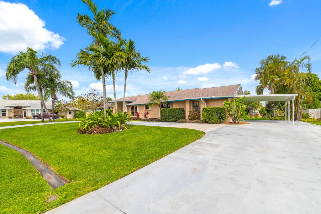 Photo of 1917 SE Bolton Avenue, Port Saint Lucie, FL 34952 (MLS # R10975228)