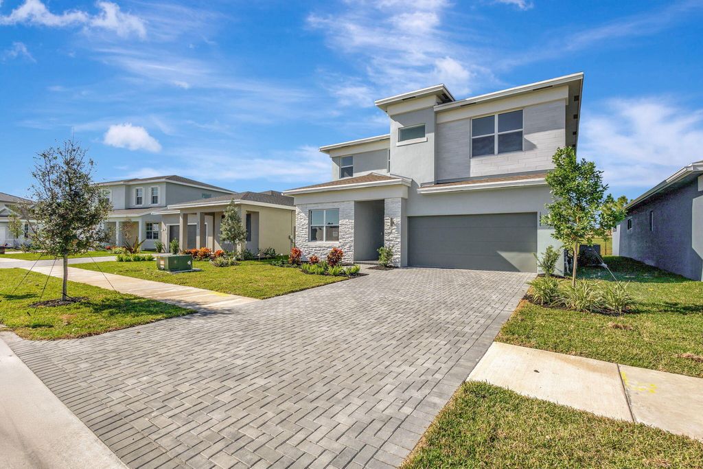 Photo of 1549 Sawgrass Whisper Way, The Acreage, FL 33470 (MLS # B26001510)