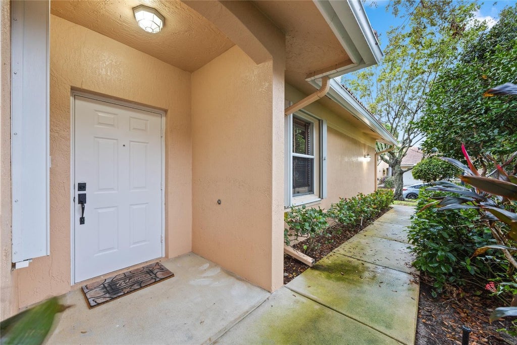 Photo of 243 Coral Trace Lane, Delray Beach, FL 33445 (MLS # F10519550)