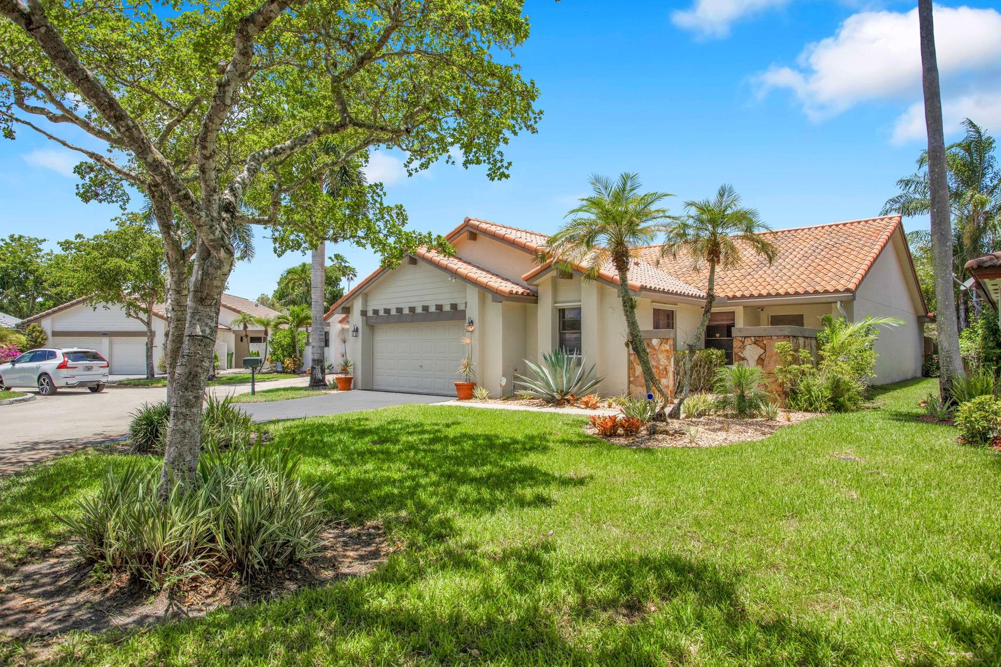 Welcome to Weston! This well-maintained & warm 3 bedroom/2 bathroom/ 2 car-garage single-family home is nestled on a quiet cul-de-sac in the popular neighborhood of Country Isles. Boasting many desirable features such as a NEW A/C, complete water filtration system throughout the entire property for optimal good health, & freshly painted interior. Updated bathrooms & kitchen with stainless steel appliances, split floor plan, a fully screened, oversized patio, & on the same power grid as Cleveland Clinic Hospital, so you'll never lose power. Low HOA fee, which includes the refreshing community pool! Close to A+ schools, houses of worship, major highways, restaurants, numerous parks, and Sawgrass Mills Mall. Visit this beautiful property and make it YOUR "home sweet home"!