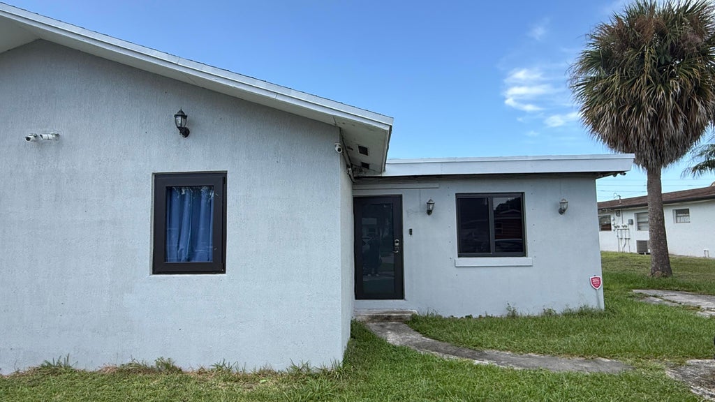 Photo of 4727 Myrtle Lane, West Palm Beach, FL 33417 (MLS # B26066027)