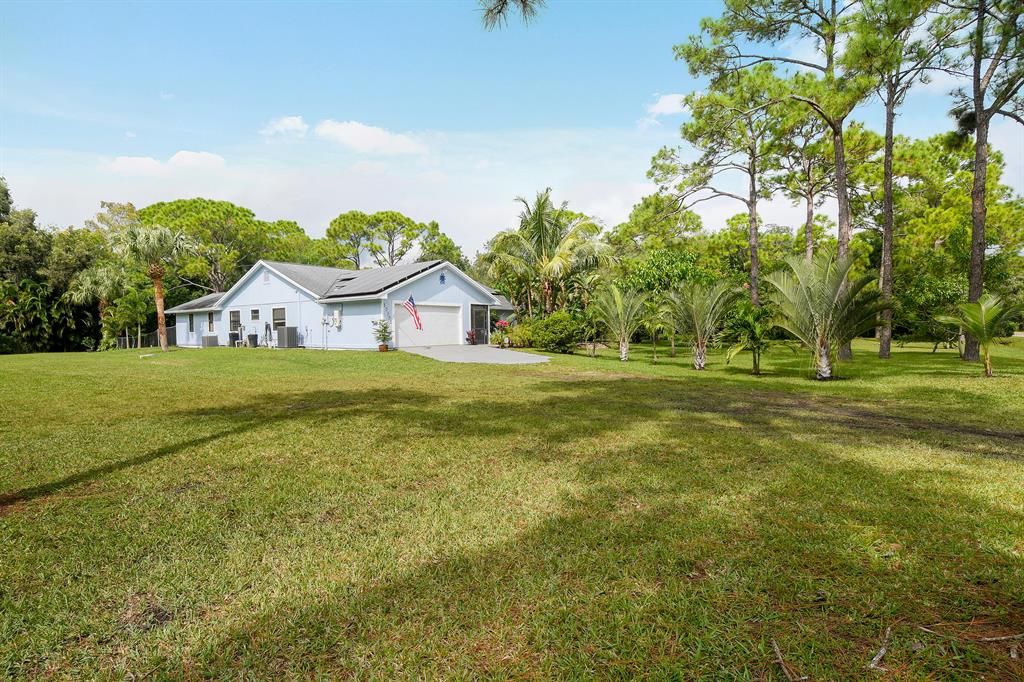Photo of 15355 78th Drive N, Palm Beach Gardens, FL 33418 (MLS # R10755426)