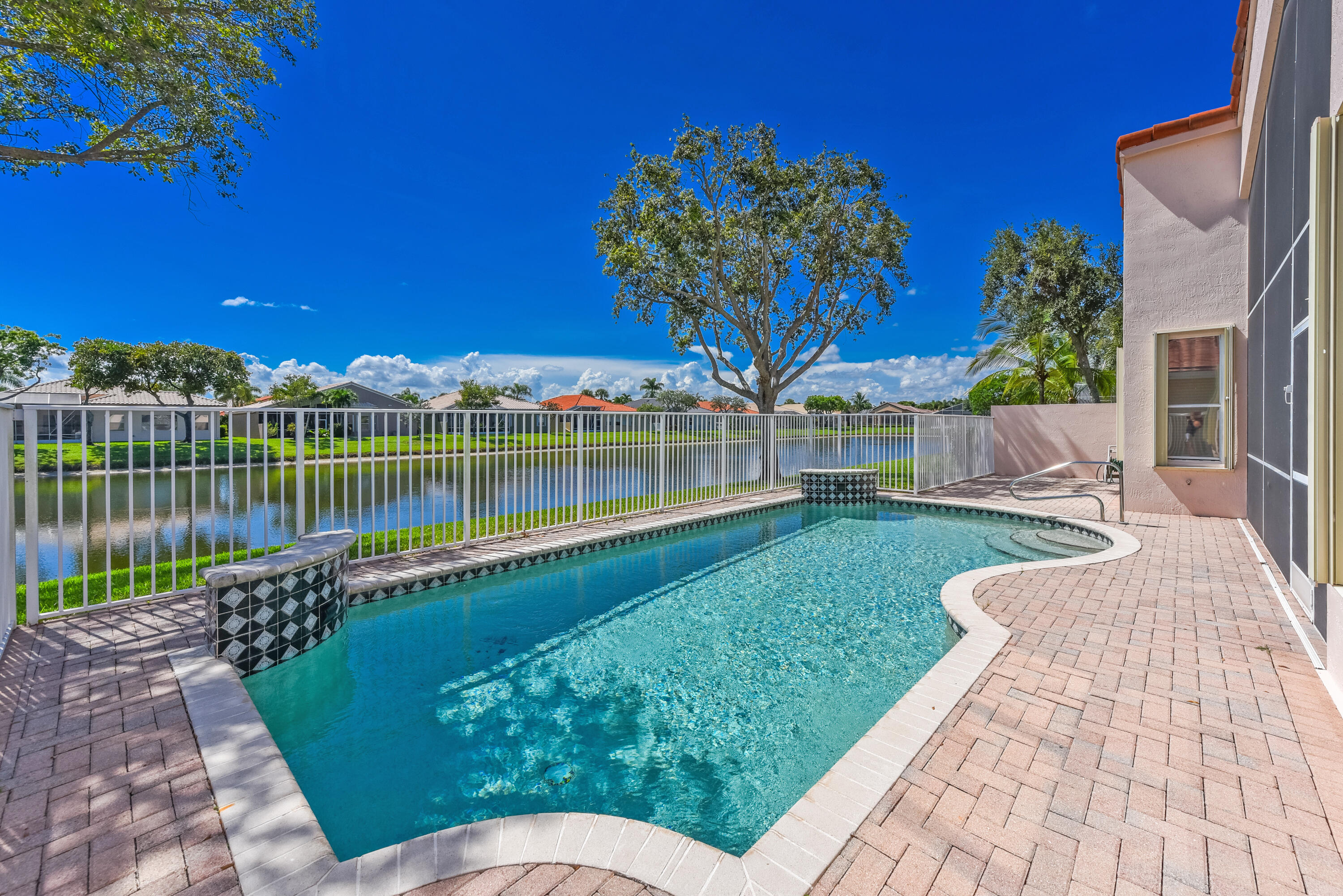 RUN, DON'T WALK, to this Former Model Home--LAKEFRONT HEATED POOL retreat in a premier 55+ community! Featuring 2-3 bedrooms, 2 baths, and a fantastic open floor plan, this gem offers stunning water views from the moment you step inside. Ideally positioned on a tranquil lot with no neighbors on one side, it's perfect for both everyday living and entertaining. Premium finishes and designer flair throughout, with a versatile 3rd bedroom ideal as a den, office, or guest space. Enjoy Ponte Vecchio's resort-style amenities--soon to include a new sports complex with state-of-the-art pickleball, bocce & more--no assessment! Live and play the Ponte Vecchio way!