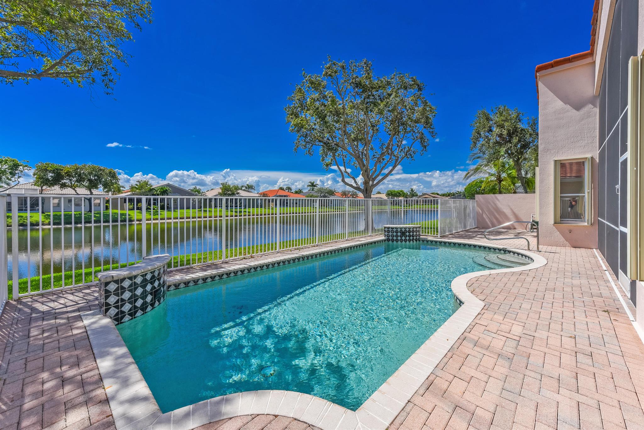 RUN, DON'T WALK, to this Former Model Home--LAKEFRONT HEATED POOL retreat in a premier 55+ community! Featuring 2-3 bedrooms, 2 baths, and a fantastic open floor plan, this gem offers stunning water views from the moment you step inside. Ideally positioned on a tranquil lot with no neighbors on one side, it's perfect for both everyday living and entertaining. Premium finishes and designer flair throughout, with a versatile 3rd bedroom ideal as a den, office, or guest space. Enjoy Ponte Vecchio's resort-style amenities--soon to include a new sports complex with state-of-the-art pickleball, bocce & more--no assessment! Live and play the Ponte Vecchio way!