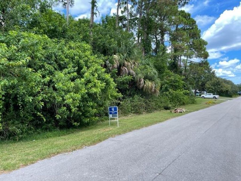 Photo of 2017 SW Justison Avenue, Port Saint Lucie, FL 34953 (MLS # R10824545)