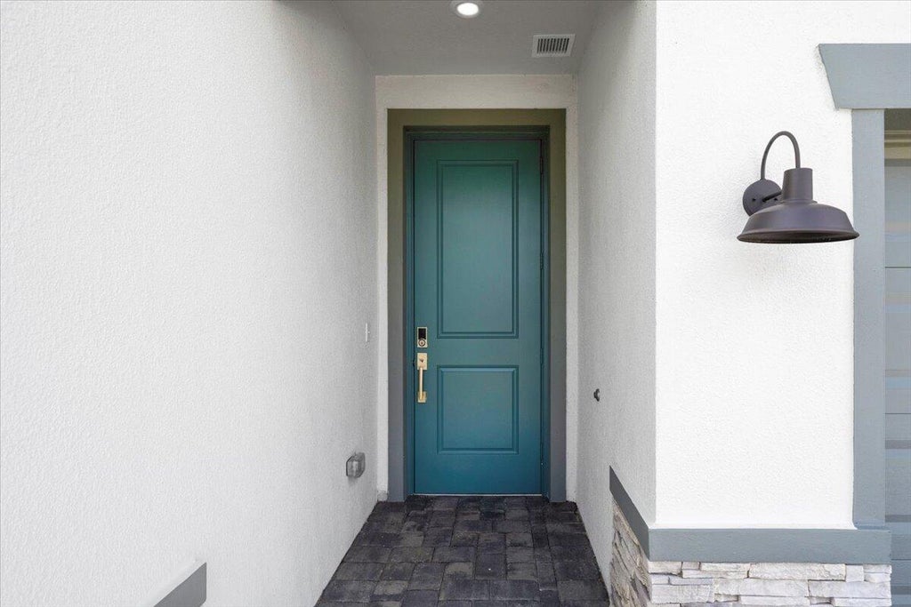 Photo of 8942 Dahlia Circle, Port Saint Lucie, FL 34986 (MLS # R11004514)