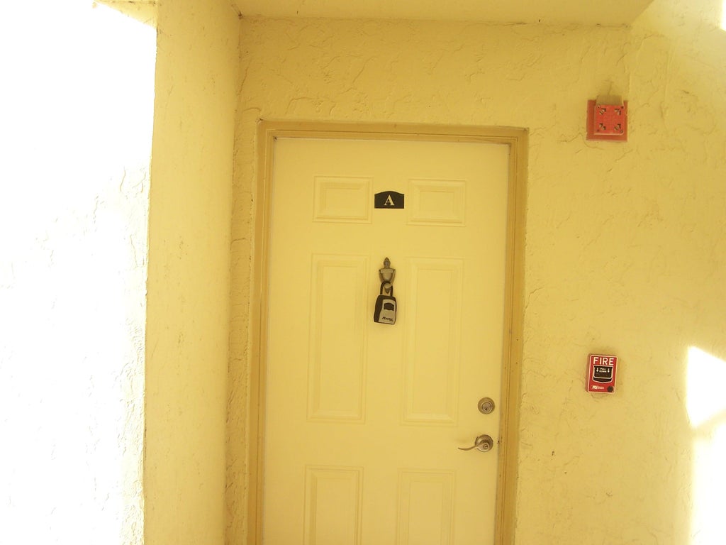 Photo of 1620 Balfour Point Drive, West Palm Beach, FL 33411 (MLS # B26075962)