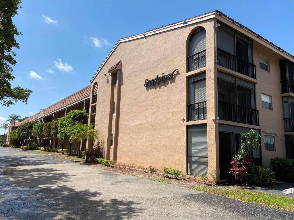 Photo of 2700 Coral Springs Drive #211, Coral Springs, FL 33065 (MLS # F10421796)
