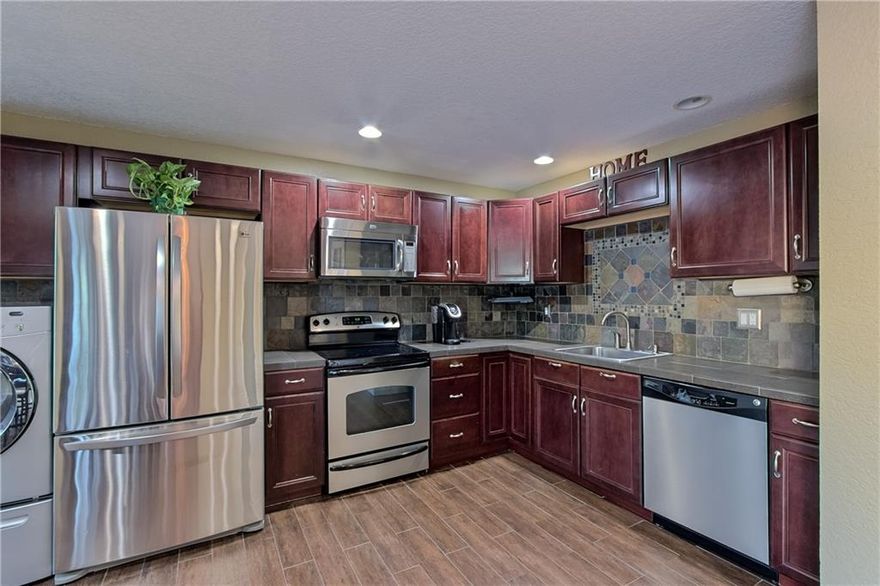 Luxuriously renovated townhome in sought after location in Davie! Ready to move in now. This townhome features 2 bedroom 2 1/2 bath & over 1,500 Sq/ft with two large master suites. Very Spacious recently renovated with top of the line upgrades! Features Stainless Steel Appliances, Full Size Washer & Dryer , Tankless Water Heater, Custom Closet Organizers , Custom Bathrooms, and private fenced back yard/patio. HOA covers building exterior insurance, lawn maintenance, plus pool & tennis courts. Close to Colleges and all major highways . The clean friendly community of Arrowhead Golf & Tennis Club may qualify for a 5% down payment conventional mortgage.Pets are welcomed in the community and will love your fully fenced private back yard. Priced to sell. Schedule your private showing today! Luxuriously renovated townhome in sought after location in Davie! Ready to move in now. This townhome features 2 bedroom 2 bath and over 1,500 Sq/ft with two large master suites. Very Spacious recently renovated with top of the line upgrades! Features Stainless Steel Appliances, Full Size Washer & Dryer , Tankless Water Heater, Custom Closet Organizers , Custom Bathrooms, and private fenced back yard/patio. HOA covers building exterior insurance, lawn maintenance, plus pool & tennis courts. Close to Colleges and all major highways . The clean friendly community of Arrowhead Golf & Tennis Club may qualify for a 5% down payment conventional mortgage. Pets are very welcomed in the community and will love your fully fenced private back yard. Priced to sell!Schedule your private showing today.