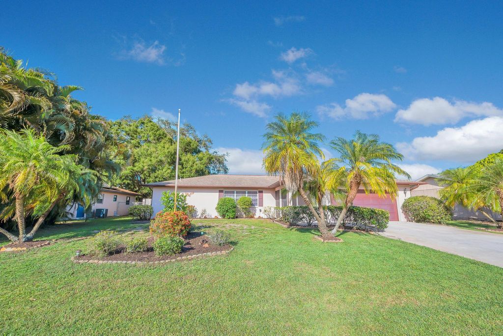 Photo of 869 SE O&#39;Donnell Lane Ln, Port St Lucie, FL 34983 (MLS # R10810463)