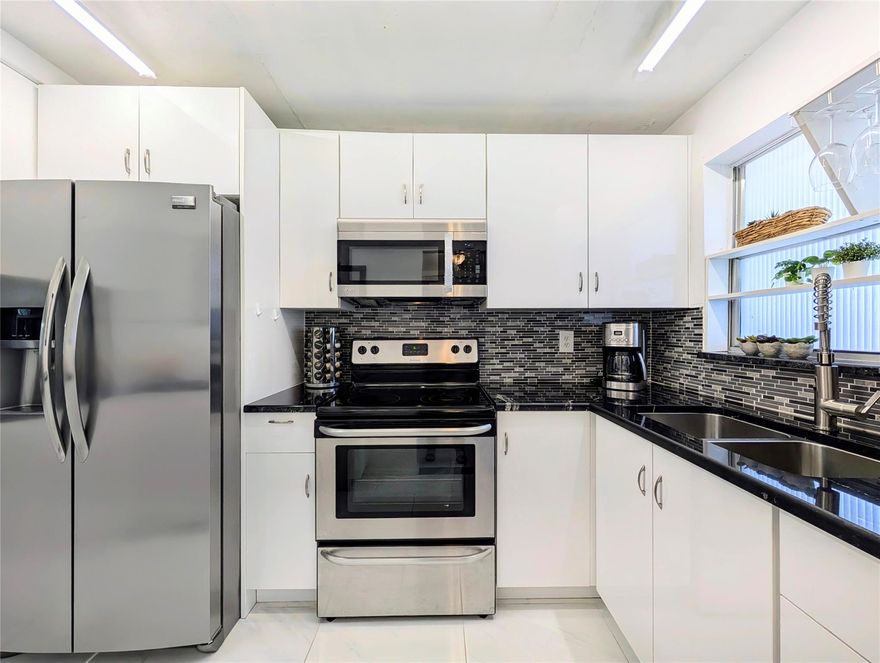 OWNER LOSS IS YOUR GAIN! This is the BEST DEAL in Sunrise Lakes! Come to see this BEAUTIFULLY UPDATED UNIT, and be ready to call it home! Enjoy being part of a community that has so much to offer: Theater, fitness center, billiard room, shuffle boards, tennis courts, shuttle bus, golfing nearby, and more. Close to shopping, restaurants, banks, the Sawgrass Mills Mall, and just minutes away to the beach. Not in the mood to go out? Stay home and enjoy the day from your enclosed balcony.  ALL RENOVATIONS WERE MADE FOR YOU: Porcelain floors throughout, modern kitchen and bathrooms cabinetry, stone counter tops, barn glass doors in bathrooms, LED light fixtures... Check the photos and fall in love!  Price is firm.