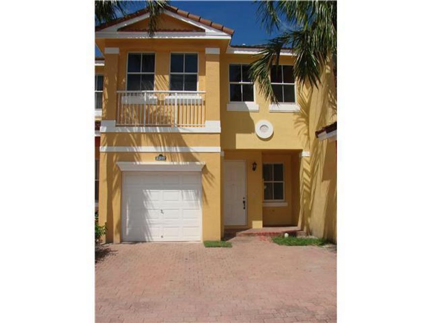 TWO STOREY VILLA ACROSS A COMMUNITY POOL WITH A WIDE 2 CAR DRIVEWAY FEATURES ALL 4 BEDROOMS UPSTAIRS. ALL TILED LIVING, DINING, FAMILY ROOMS DOWNSTAIRS, A FULLY EQUIPPED KITCHEN, FULL SIZE WASHER & DRYER IN A SEPARATE LAUNDRY ROOM. UNIT FEATURES A BRAND NEW CARPET THROUGIUT, FRESHLY PAINTED AND CLEANED - READY FOR IMMEDIATE OCCUPANCY! ''A'' RATED SCHOOL DISTRICT, WALKING DISTANCE TO PUBLIX PLAZA, JUST MIN AWAY FROM WELLINGTON REGIONAL, WELLINGTON MALL, SHOPPING, ENTERTAINMENT,PARKS, EQUESTRIAN CENTRS, ETC!