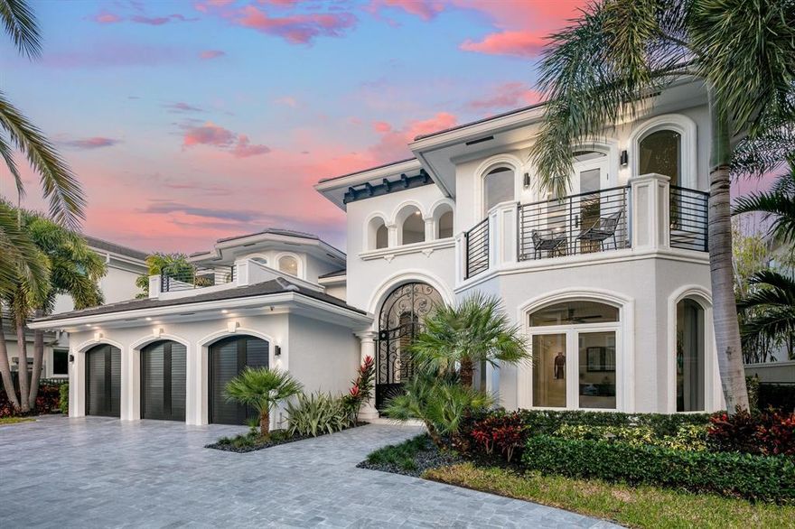 Nestled on Boca Harbour Island, this luxurious estate home epitomizes the ultimate in waterfront living. Boasting 80 feet of direct intracoastal waterfront with tranquil preserve views, this contemporary showplace is truly breathtaking. The outdoor spaces are equally impressive, including private waterfront balconies, terraces, a resort-style pool, spa, dock, and summer kitchen with cabana.Indoors, no expense was spared in the design and upgrades, including a fireplace with floor-to-ceiling stone facade, steam showers, and a chef's kitchen with high-end Wolfe appliances, Subzero Cooling, and a butler's pantry. The massive owner's suite includes multiple seating areas, a private balcony, a walk-in closet, and a spa-like en-suite with a vessel tub and step-in shower.For those seeking t