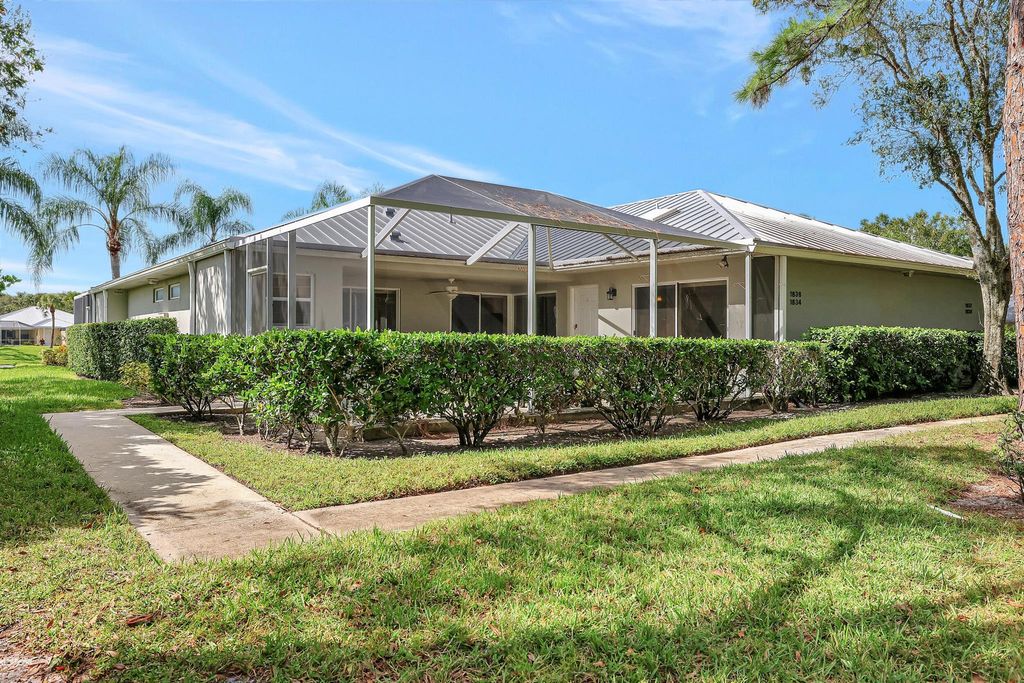 Photo of 1836 SW Waterfall Boulevard, Palm City, FL 34990 (MLS # R10927954)