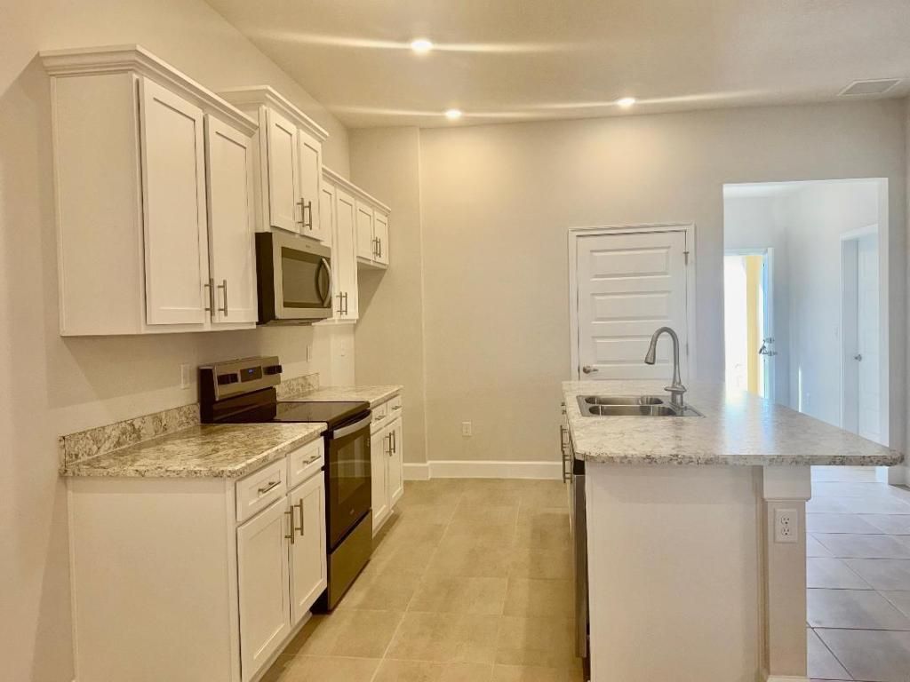 Photo of 8662 Giovanni Avenue, Fort Pierce, FL 34951 (MLS # R11148019)