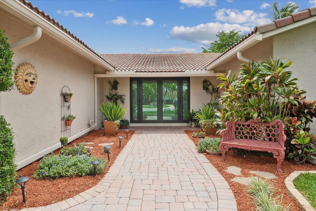 Photo of 8710 Mahogany Avenue, Plantation, FL 33324 (MLS # F10499891)