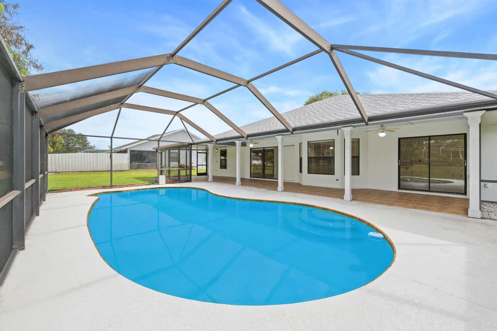 Photo of 5400 NW Emblem Street, Port Saint Lucie, FL 34983 (MLS # B26062089)